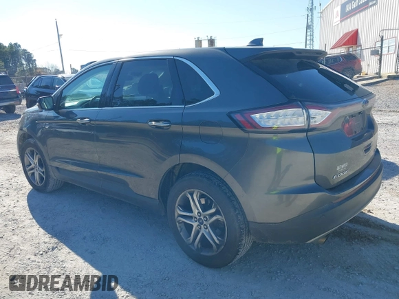 2015 Ford Edge Titanium z VIN 2FMTK3K90FBB13499, wystawiony jako IAAI lot #41492084 z przebiegiem 256 649 mil mil oraz . Historia ofert i sprzedaży dostępna na DreamBid. Obrazek 14.