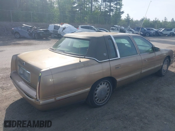 1998 Cadillac DeVille z VIN 1G6KD54Y3WU730001, wystawiony jako IAAI lot #42369702 z przebiegiem 88 540 mil mil oraz . Historia ofert i sprzedaży dostępna na DreamBid. Obrazek 4.