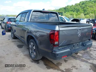 2018 Honda Ridgeline RTL-E with VIN 5FPYK3F74JB004162, listed as a IAAI auction lot 42180687 with 160,805 mi miles and . Bid and sale history available at DreamBid. Image 3.