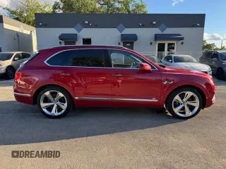 2017 Bentley Bentayga W12 z VIN SJAAC2ZV1HC014037, wystawiony jako Copart lot #47256005 z przebiegiem 36 099 mil mil oraz Szkoda całkowita • Salvage title. Historia ofert i sprzedaży dostępna na DreamBid. Obrazek 13.