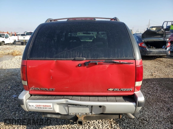 1995 Chevrolet Blazer z VIN 1GNDT13W4S2243226, wystawiony jako Copart lot #81429904 z przebiegiem 1 757 497 mil mil oraz Szkoda całkowita • Salvage title. Historia ofert i sprzedaży dostępna na DreamBid. Obrazek 6.