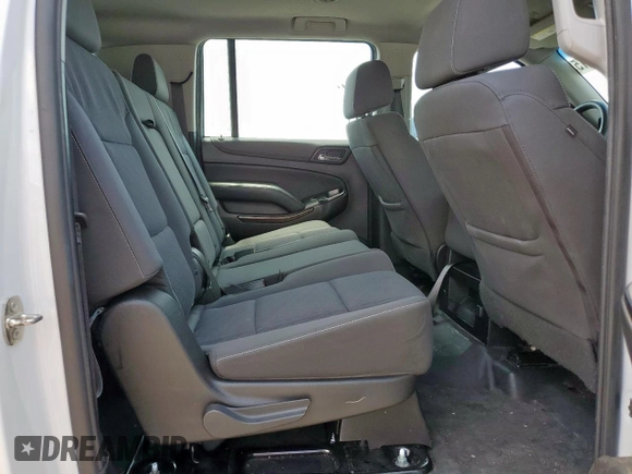 2019 Chevrolet Suburban with VIN 1GNSCKEC9KR230768, listed as a Copart auction lot 58822915 with 96,823 mi miles and Salvage title. Bid and sale history available at DreamBid. Image 11.