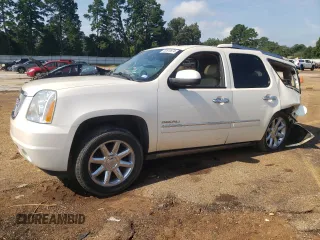 2013 GMC Yukon Denali with VIN 1GKS2EEF9DR311929, listed as a Copart auction lot 63810874 with 122,356 mi miles and Salvage Title. Bid and sale history available at carsss.com. Image 1.