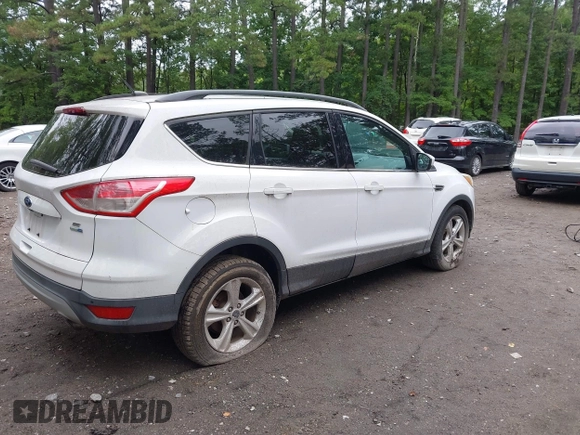 2014 Ford Escape SE with VIN 1FMCU9GX8EUB20861, listed as a IAAI auction lot 42711534 with Not provided miles and . Bid and sale history available at DreamBid. Image 4.