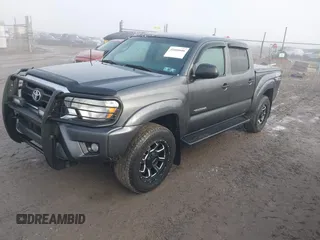 2015 Toyota Tacoma with VIN 3TMLU4EN7FM201302, listed as a IAAI auction lot 41666606 with 200,504 mi miles and . Bid and sale history available at DreamBid. Image 18.