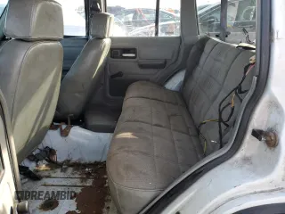 1994 Jeep Cherokee Sport with VIN 1J4FT68S0RL142185, listed as a Copart auction lot 80419344 with 172,294 mi miles and Salvage Title. Bid and sale history available at carsss.com. Image 11.