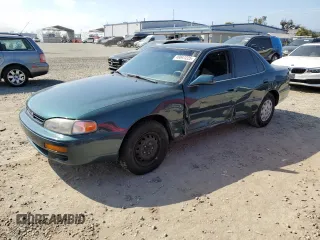 1996 Toyota Camry DX with VIN 4T1BG12K7TU727234, listed as a Copart auction lot 49841225 with 171,003 mi miles and Salvage Title. Bid and sale history available at carsss.com. Image 1.