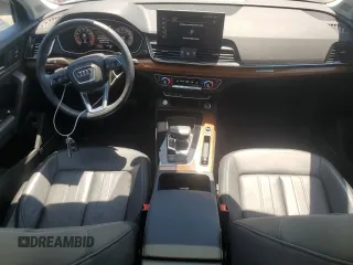 2021 Audi Q5 Premium Plus with VIN WA1BAAFY9M2108985, listed as a Copart auction lot 61656745 with 57,572 mi miles and Salvage title. Bid and sale history available at DreamBid. Image 8.