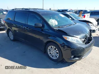 2014 Toyota Sienna XLE with VIN 5TDYK3DC9ES434179, listed as a IAAI auction lot 41199703 with 75,084 mi miles. Bid and sale history available at carsss.com. Image 1.