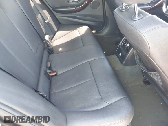 2015 BMW 3 Series 328i with VIN WBA3C1C58FK123489, listed as a IAAI auction lot 42026400 with 127,880 mi miles and . Bid and sale history available at carsss.com. Image 8.