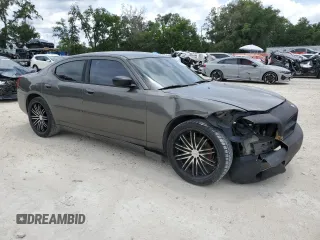 2009 Dodge Charger SE z VIN 2B3KA43DX9H530580, wystawiony jako Copart lot #58381375 z przebiegiem 300 292 mil mil oraz Szkoda całkowita • Salvage title. Historia ofert i sprzedaży dostępna na DreamBid. Obrazek 4.