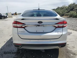 2018 Ford Fusion Titanium z VIN 3FA6P0D96JR155318, wystawiony jako Copart lot #53740505 z przebiegiem 86 567 mil mil oraz Szkoda całkowita • Salvage title. Historia ofert i sprzedaży dostępna na DreamBid. Obrazek 6.