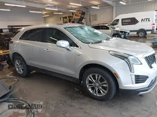 2020 Cadillac XT5 Premium Luxury FWD with VIN 1GYKNCRS5LZ172325, listed as a IAAI auction lot 41275366 with 102,796 mi miles and . Bid and sale history available at carsss.com. Image 1.
