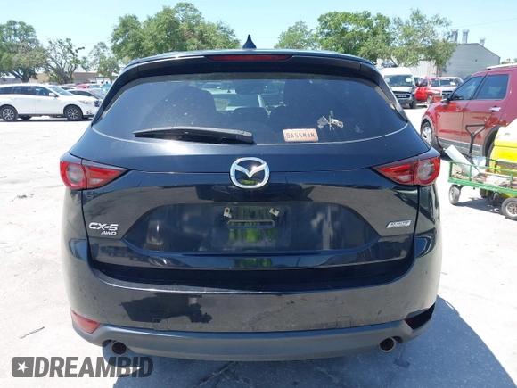 2017 Mazda CX-5 Grand Touring with VIN JM3KFBDL6H0200830, listed as a IAAI auction lot 42005145 with 90,510 mi miles. Bid and sale history available at carsss.com. Image 16.