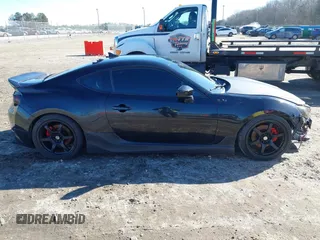 2014 Scion FR-S z VIN JF1ZNAA14E9708590, wystawiony jako IAAI lot #41278089 z przebiegiem 117 357 mil mil oraz . Historia ofert i sprzedaży dostępna na DreamBid. Obrazek 14.