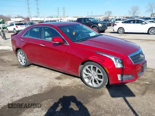 2014 Cadillac ATS Performance z VIN 1G6AJ5S39E0156912, wystawiony jako IAAI lot #41747580 z przebiegiem 93 935 mil mil oraz . Historia ofert i sprzedaży dostępna na DreamBid. Obrazek 1.