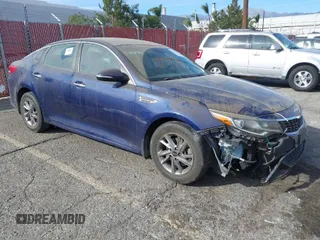 2019 Kia Optima LX with VIN 5XXGT4L36KG344839, listed as a IAAI auction lot 41399595 with 71,007 mi miles. Bid and sale history available at carsss.com. Image 1.