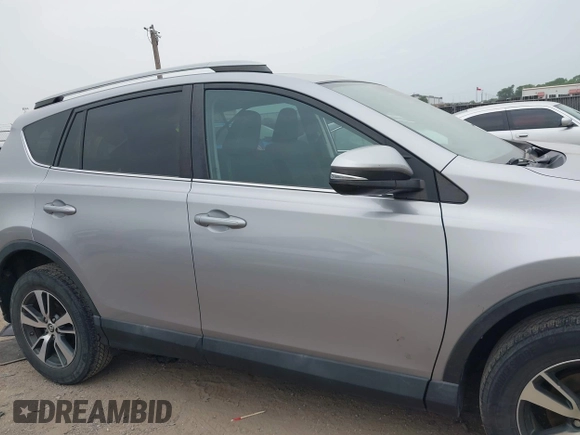 2018 Toyota RAV4 XLE с VIN 2T3WFREV0JW409842, выставлен на аукционе IAAI как лот 42057521 с пробегом 145 915 миль миль и . История ставок и продаж доступна на DreamBid. Изображение 13.