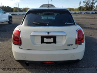 2015 MINI Cooper Hardtop 4 Door with VIN WMWXS5C59FT830039, listed as a Copart auction lot 77198974 with 43,277 mi miles and Salvage Title. Bid and sale history available at carsss.com. Image 6.