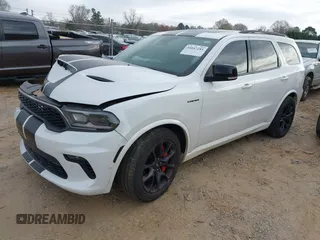 2021 Dodge Durango R/T with VIN 1C4SDJCT5MC549058, listed as a IAAI auction lot 41847281 with 99,556 mi miles and . Bid and sale history available at carsss.com. Image 2.