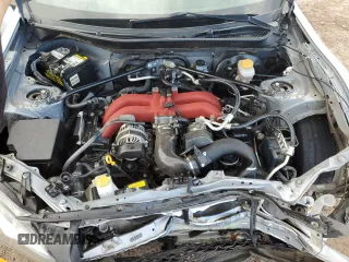 2017 Toyota 86 z VIN JF1ZNAA10H9700877, wystawiony jako Copart lot #51345715 z przebiegiem 76 409 mil mil oraz Szkoda całkowita • Salvage title. Historia ofert i sprzedaży dostępna na DreamBid. Obrazek 12.