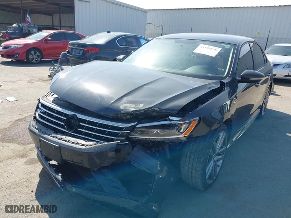 2018 Volkswagen Passat 2.0T S with VIN 1VWAA7A34JC025600, listed as a IAAI auction lot 41594079 with 92,019 mi miles. Bid and sale history available at carsss.com. Image 6.