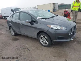 2019 Ford Fiesta SE with VIN 3FADP4BJXKM104902, listed as a IAAI auction lot 41814285 with 77,434 mi miles. Bid and sale history available at carsss.com. Image 1.