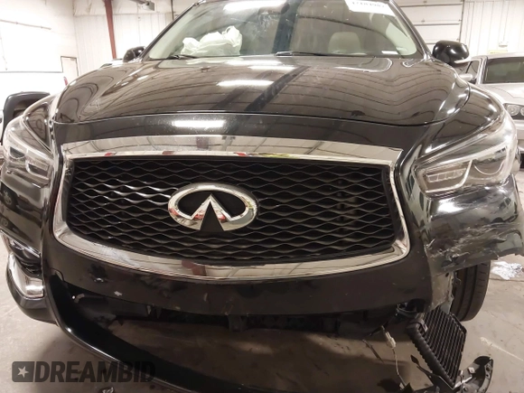 2019 Infiniti QX60 Luxe with VIN 5N1DL0MMXKC565309, listed as a IAAI auction lot 42184987 with 129,985 mi miles and . Bid and sale history available at DreamBid. Image 19.