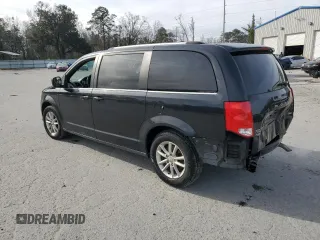 2019 Dodge Grand Caravan SXT with VIN 2C4RDGCG5KR563941, listed as a Copart auction lot 47430555 with 125,663 mi miles and Salvage Title. Bid and sale history available at DreamBid. Image 2.