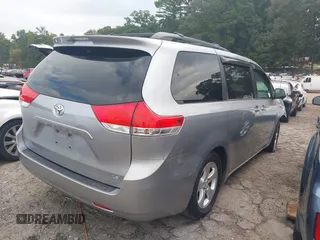 2013 Toyota Sienna LE AAS with VIN 5TDKK3DC5DS367505, listed as a IAAI auction lot 40373684 with 102,521 mi miles. Bid and sale history available at carsss.com. Image 4.