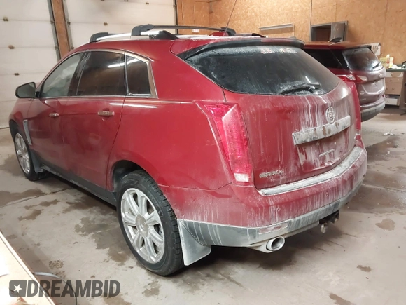 2015 Cadillac SRX Premium Collection with VIN 3GYFNGE34FS629506, listed as a IAAI auction lot 41380586 with 186,672 mi miles. Bid and sale history available at carsss.com. Image 3.
