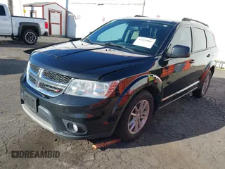 2013 Dodge Journey SXT with VIN 3C4PDCBGXDT589405, listed as a IAAI auction lot 41421902 with 152,964 mi miles and . Bid and sale history available at DreamBid. Image 2.