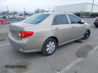 2010 Toyota Corolla with VIN 2T1BU4EEXAC438136, listed as a IAAI auction lot 41487463 with 154,379 mi miles. Bid and sale history available at carsss.com. Image 4.