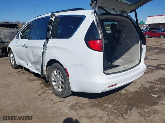 2020 Chrysler Voyager LXI with VIN 2C4RC1DGXLR256863, listed as a IAAI auction lot 41744700 with 86,470 mi miles. Bid and sale history available at carsss.com. Image 3.
