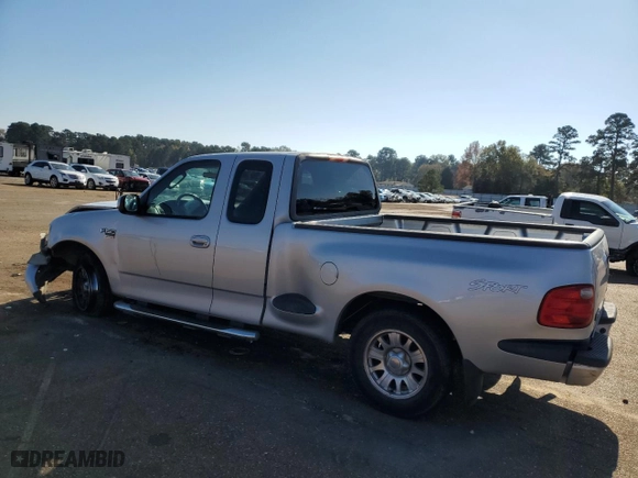 2003 Ford F-150 XL with VIN 1FTRX07W33KB36757, listed as a Copart auction lot 82878694 with 0 mi miles and Salvage Title. Bid and sale history available at carsss.com. Image 2.