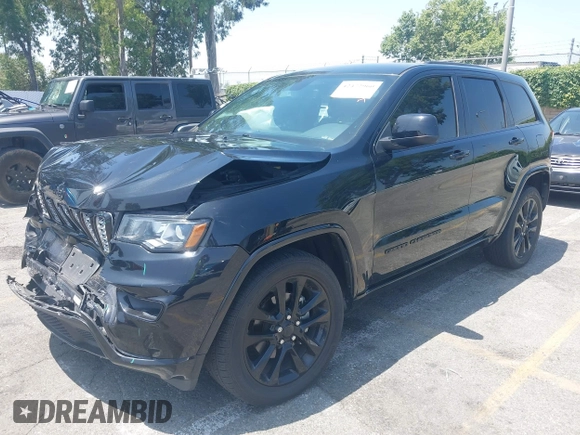 2018 Jeep Grand Cherokee Altitude with VIN 1C4RJEAG2JC428536, listed as a IAAI auction lot 42472960 with 74,631 mi miles and . Bid and sale history available at DreamBid. Image 17.