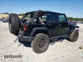 2007 Jeep Wrangler Unlimited Sahara with VIN 1J4GA59197L141821, listed as a Copart auction lot 76897044 with 124,070 mi miles and Salvage title. Bid and sale history available at DreamBid. Image 3.