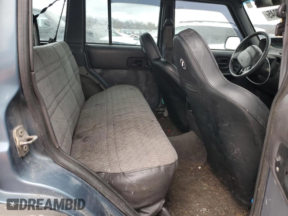 1999 Jeep Cherokee Sport with VIN 1J4FF68S4XL567848, listed as a Copart auction lot 43222045 with 280,178 mi miles and Salvage title. Bid and sale history available at DreamBid. Image 10.