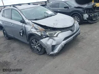 2016 Toyota RAV4 LE with VIN 2T3ZFREV2GW249128, listed as a IAAI auction lot 41696489 with 115,816 mi miles. Bid and sale history available at carsss.com. Image 1.