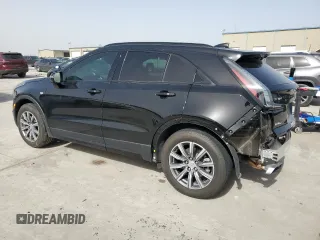 2020 Cadillac XT4 FWD Sport z VIN 1GYFZER49LF079277, wystawiony jako Copart lot #46980405 z przebiegiem 64 140 mil mil oraz Szkoda całkowita • Salvage title. Historia ofert i sprzedaży dostępna na DreamBid. Obrazek 2.