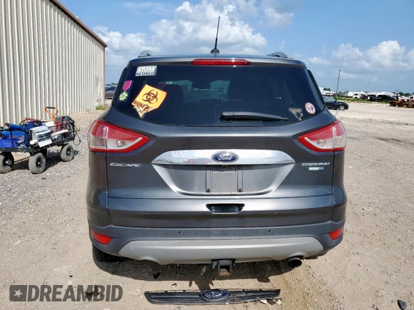 2016 Ford Escape Titanium с VIN 1FMCU9J97GUB28172, выставлен на аукционе Copart как лот 59658095 с пробегом Не указан миль и Списание • Salvage title. История ставок и продаж доступна на DreamBid. Изображение 6.