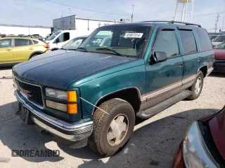 1998 GMC Yukon with VIN 1GKEK13RXWJ723572, listed as a Copart auction lot 65987314 with 237,503 mi miles and Salvage Title. Bid and sale history available at carsss.com. Image 1.