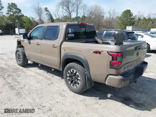 2023 Nissan Frontier PRO-4X with VIN 1N6ED1EKXPN620732, listed as a IAAI auction lot 41839561 with 27,496 mi miles. Bid and sale history available at carsss.com. Image 3.