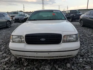 1999 Ford Crown Victoria Police with VIN 2FAFP71W4XX178478, listed as a Copart auction lot 71813314 with 207,956 mi miles and Salvage Title. Bid and sale history available at carsss.com. Image 5.