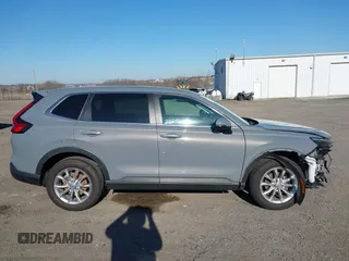 2025 Honda CR-V EX-L with VIN 2HKRS4H70SH402648, listed as a IAAI auction lot 41634883 with 21,954 mi miles and . Bid and sale history available at DreamBid. Image 14.