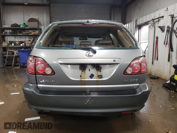 2000 Lexus RX 300 with VIN JT6HF10U5Y0113942, listed as a Copart auction lot 43276535 with 225,533 mi miles and Salvage Title. Bid and sale history available at carsss.com. Image 6.