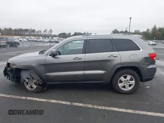 2011 Jeep Grand Cherokee 70th Anniversary with VIN 1J4RR4GG0BC608829, listed as a IAAI auction lot 41960876 with 231,714 mi miles. Bid and sale history available at carsss.com. Image 14.