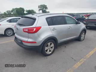 2012 Kia Sportage LX with VIN KNDPBCA24C7214432, listed as a IAAI auction lot 42530116 with 127,623 mi miles and . Bid and sale history available at DreamBid. Image 4.