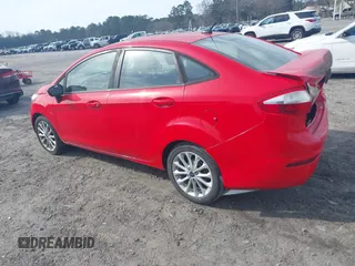 2014 Ford Fiesta SE with VIN 3FADP4BJ8EM170837, listed as a IAAI auction lot 41656071 with 128,334 mi miles and . Bid and sale history available at DreamBid. Image 3.