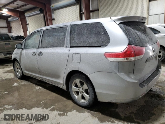 2012 Toyota Sienna with VIN 5TDZK3DC7CS231079, listed as a Copart auction lot 41809535 with 157,154 mi miles and Salvage Title. Bid and sale history available at carsss.com. Image 2.
